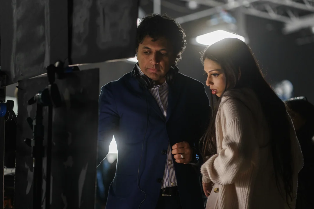 M. Night Shyamalan and Saleka Shyamalan behind the scenes of M. Night Shyamalan's black comedy crime thriller film, Trap