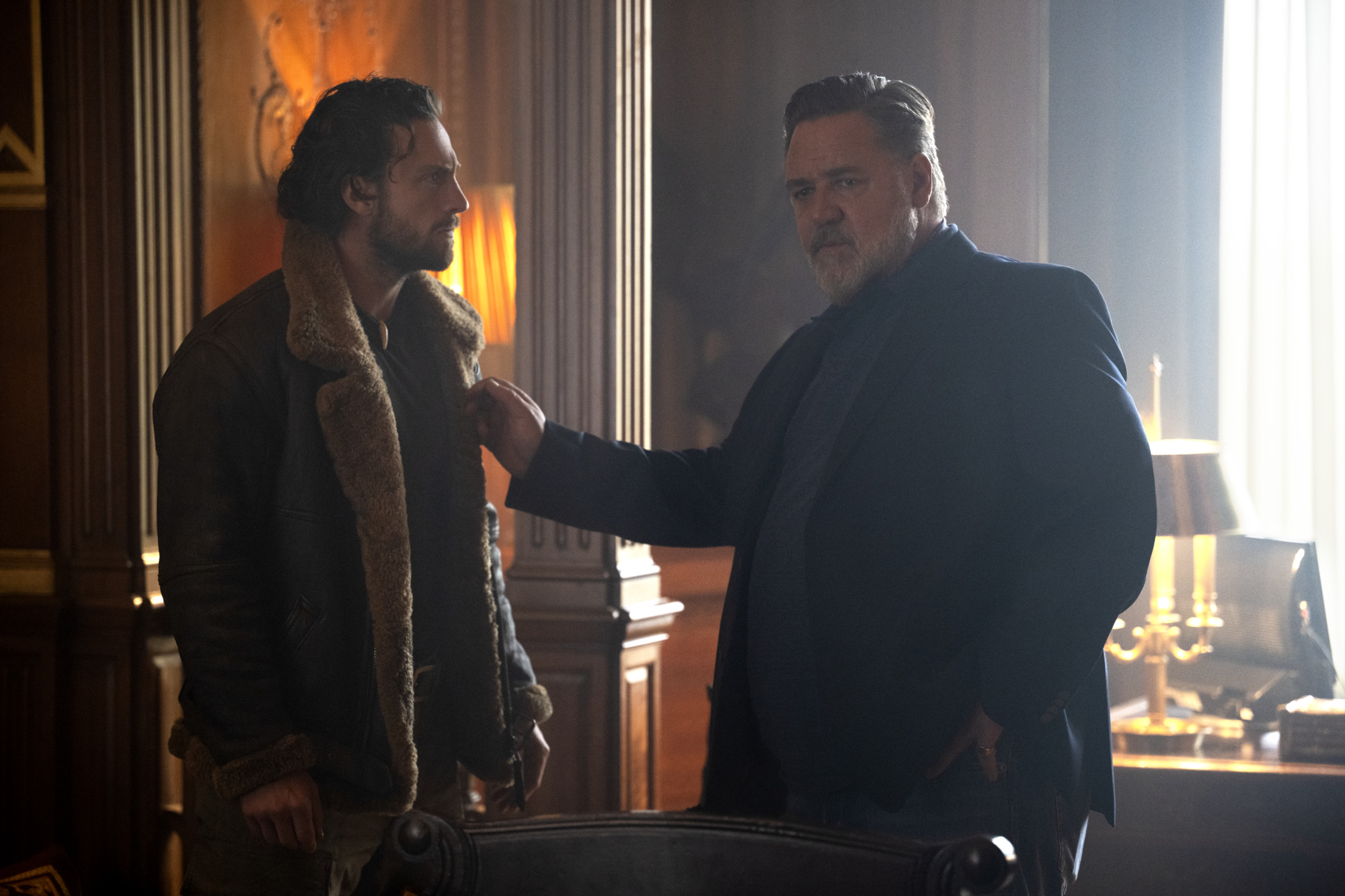 Aaron Taylor Johnson and Russell Crowe in the Sony Pictures Spider Man Universe action thriller film, Kraven the Hunter