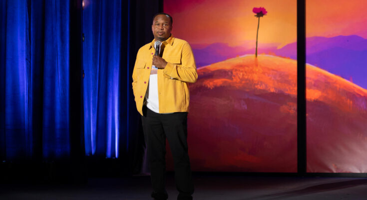 A still from Roy Wood Jr's Hulu stand up comedy special, Lonely Flowers